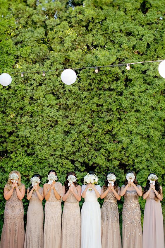 These mismatched bridesmaid dresses are so pretty! (and what a great photo idea,...
