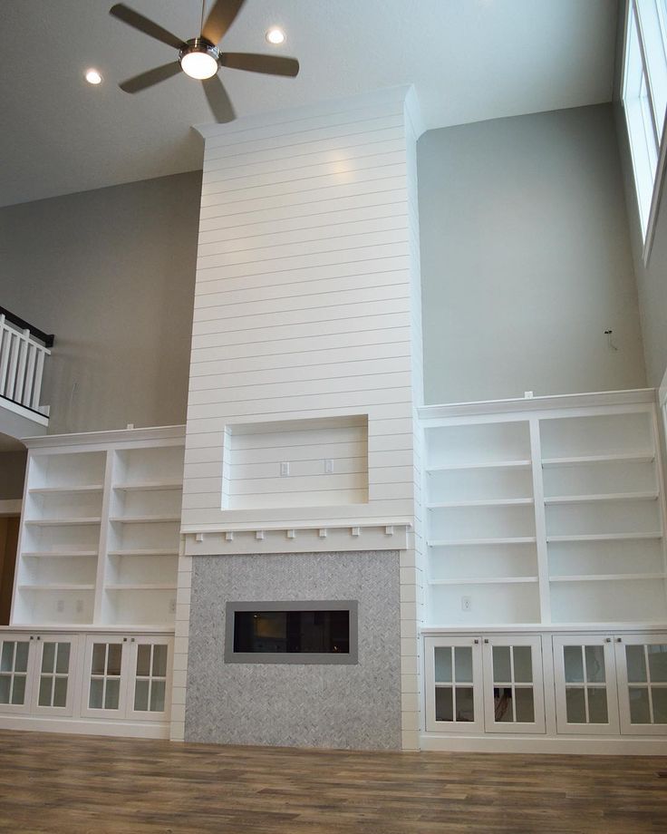 Dining room fireplace, stone and shiplap with built ins ...