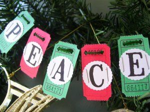This super easy Merry Christmas garland is made out of blank red and green tickets. A fun Christmas craft to make with your kids!