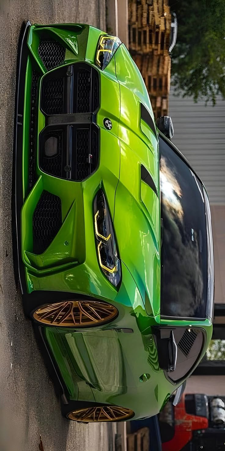 A Green Sports Car Parked On The Side Of A Building a-green-sports-car-parked-on-the-side-of-a-building