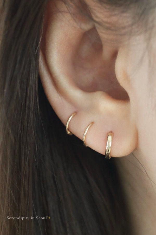 14K gold thin small huggie hoops! #earpiercings #huggiehoop #smallhoop #goldhoop