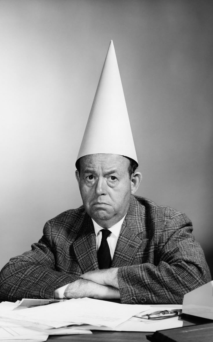 A Modern Dunce s Cap Cap The Old Curiosity Shop Business Man the-extraordinary-evolution-of-the-dunce-cap-oddfeed