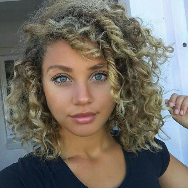 Skinny curly blonde messy