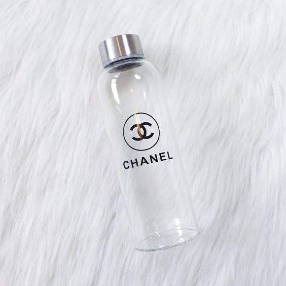 clear glass Chanel water bottle •size: About 8 tall •features