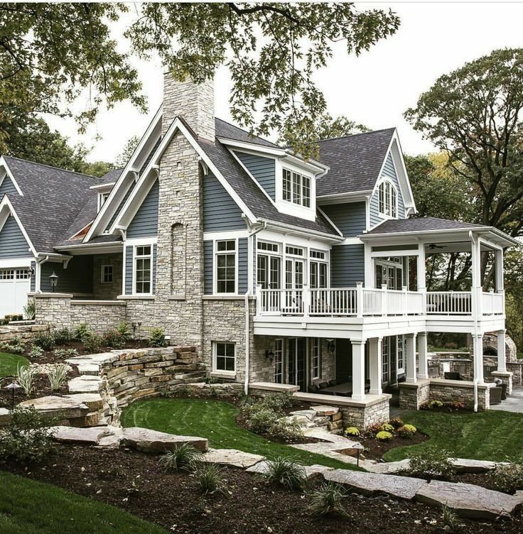 I love a house on an incline because it naturally divides the yard into gatherin...