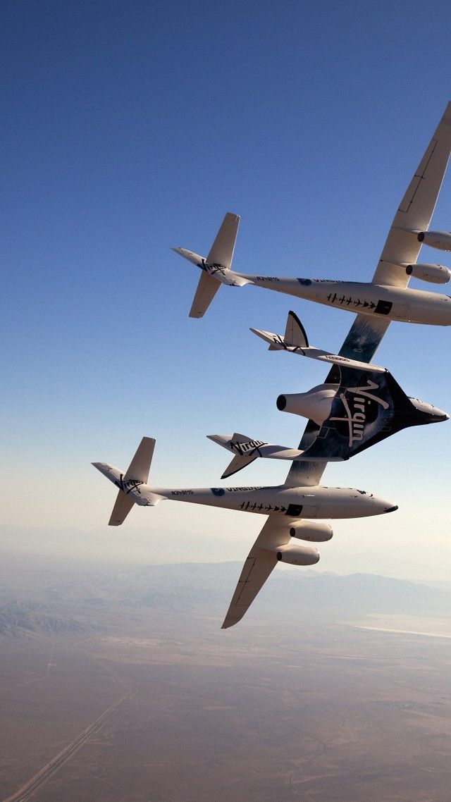 four planes flying in the sky together