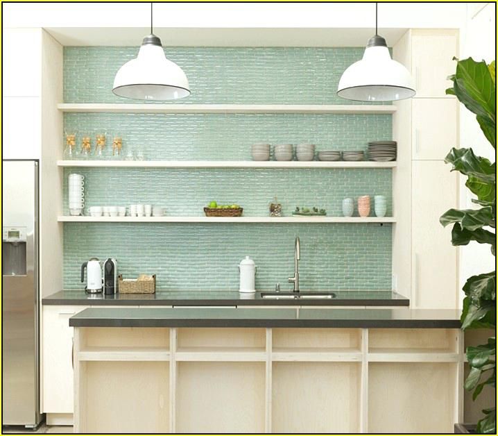 green tile backsplash packed with light green subway tile to produce