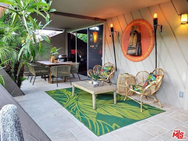 Hawaiian Harmony Polynesian Decor In Midcentury Modern Condo Is Tiki Terrific 2021 Patio Inspiration Homes Hawaiian Harmony Polynesian Decor In, Tiki Outdoor Decor