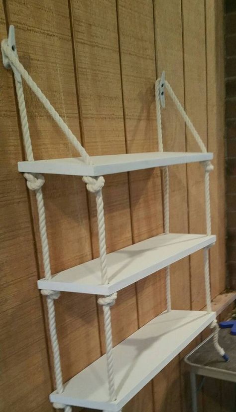 3 Tier rope shelf. The shelves measures 24 × 8 The shelves are approximately 10...