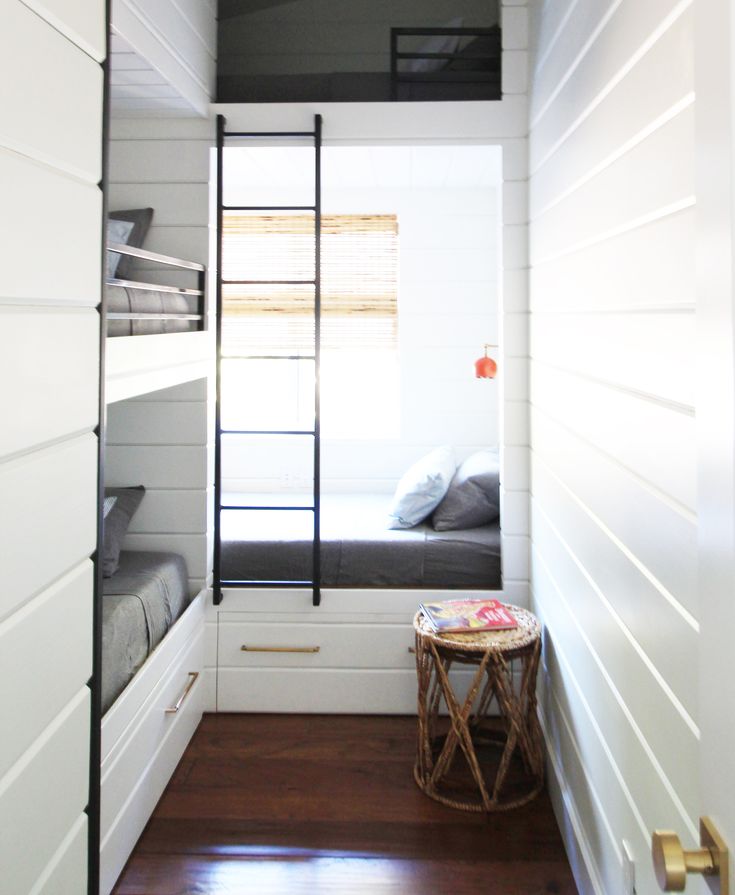 Built-in bunk beds/camp beds with hidden shelves at foot of bed Hood River Cabin Reveal! - Little Green Notebook