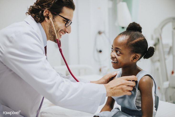 Download Premium Image Of Friendly Pediatrician Checking A Little Girls Pediatrician Hospital Doctor Girl Doctor