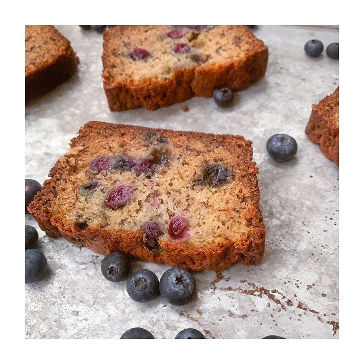 Some Blueberries And Bread Are Laying On The Table some-blueberries-and-bread-are-laying-on-the-table