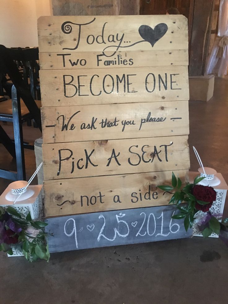 Pallet sign "Pick a seat not a side" with white lanterns and floral Pick A Seat Not A Side Pallet