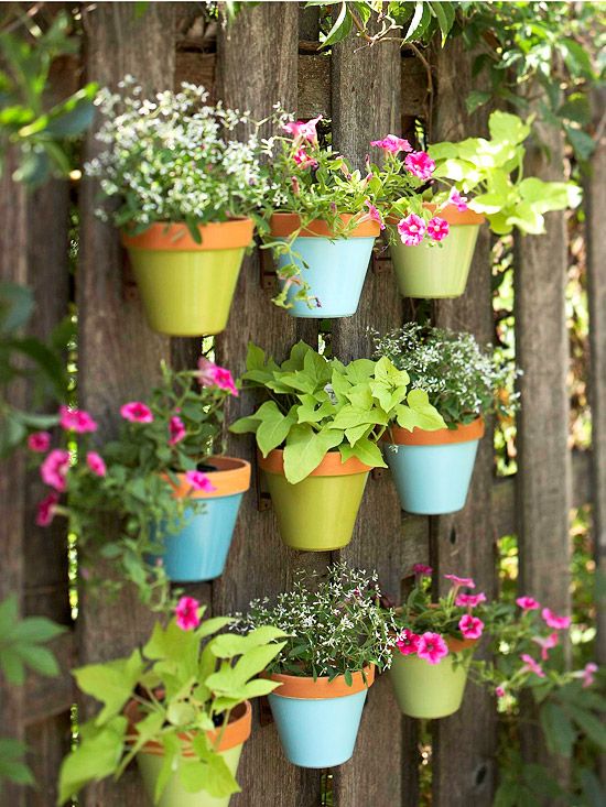 Colorful Backyard Decorating Ideas Not Just A House But Home Outdoor Wall Art Add Colour To Your Decorating With A Fence Covered Suspended Flowerpots It S For Room