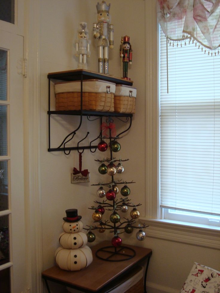 Mercury Glass Christmas tree with Longaberger Snowman and baskets, wrought iron shel… | Decorate with baskets, Longaberger basket ideas, Wrought iron christmas tree Mercury Glass Christmas tree with Longaberger Snowman and baskets, wrought iron shel… | Decorate with baskets, Longaberger basket ideas, Wrought iron christmas tree