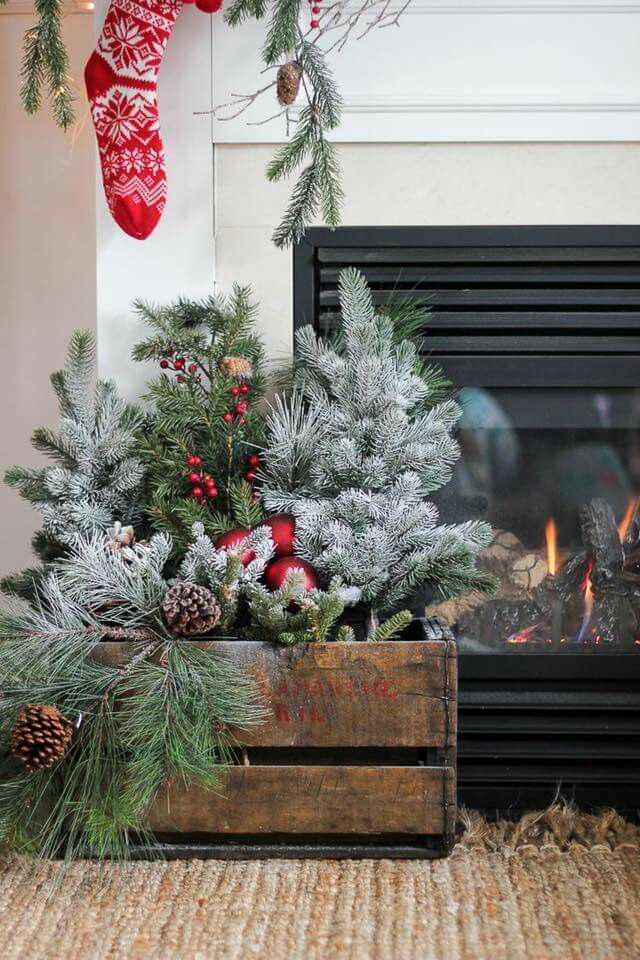 Christmas Tree Branches Beside A Fireplace Christmas Tree Branches Beside A Fireplace
