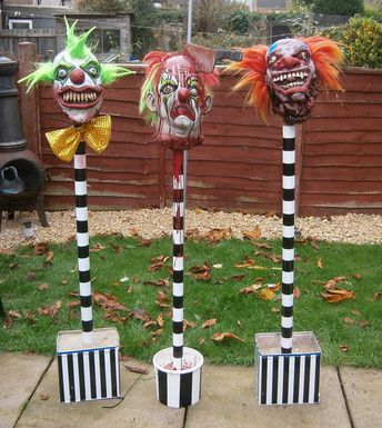 scary clown heads on black and white spikes this is awesome so doing this - Scary Clown Halloween Decorations scary clown heads on black and white spikes this is awesome so doing this - Scary Clown Halloween Decorations