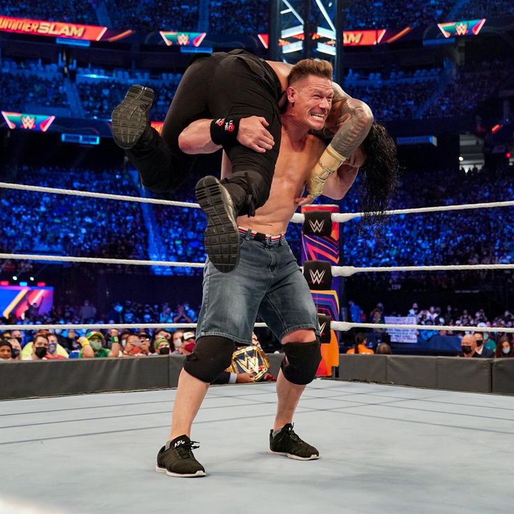 Photos Reigns and Cena leave it all in the ring in epic Universal
