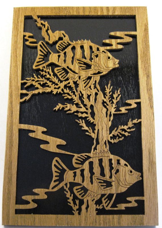 Woodcut of the Great Lakes Hand cut carving of the Great Lakes Scroll sawn woodcut of the Great Lakes.