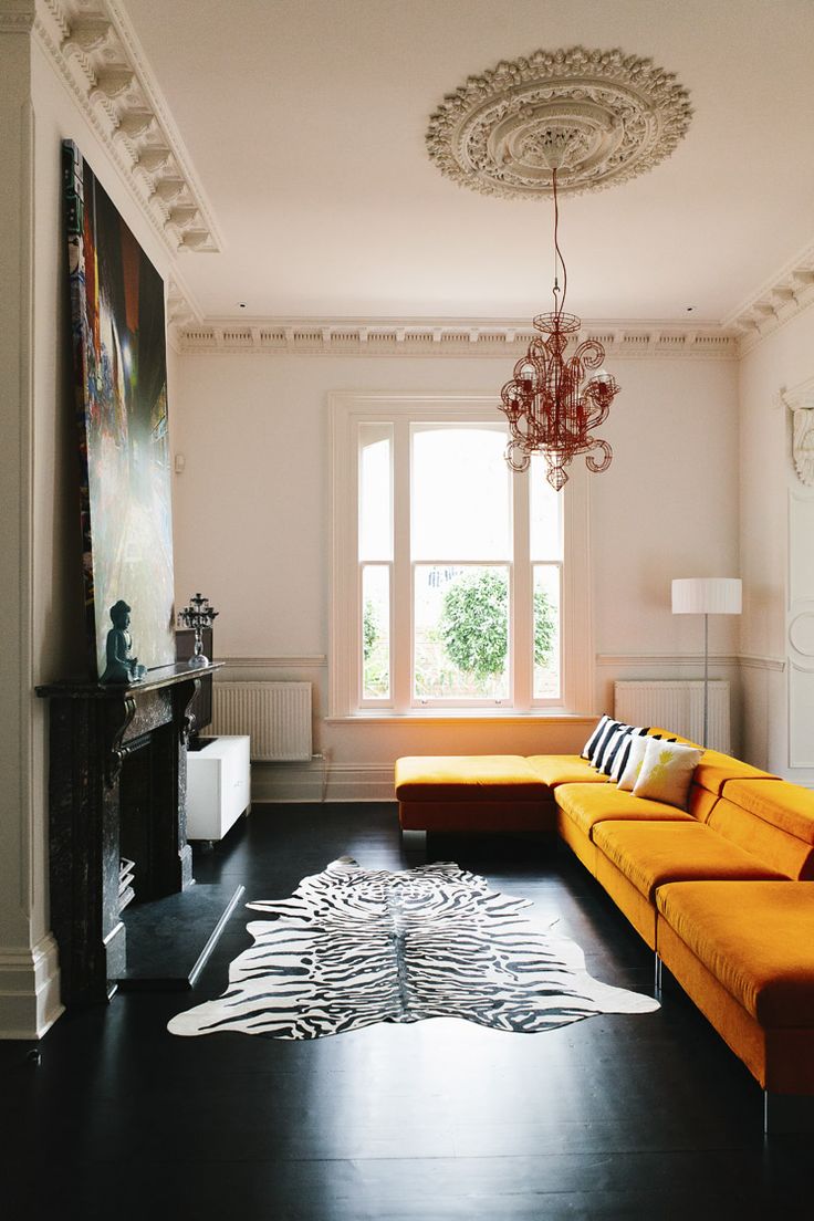 89 Best Living Room Love Images On Pinterest Rooms Family This Living Room In Mish Lilley S Uniquely Designed Home Is Complete With A Bright Yellow Sofa And Zebra Hide Rug Over Dark Stained Hardwood Floors