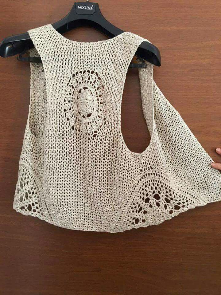 Die Westemodelle der Ineinander greifenfrauen, die Babyweste stricken, probiert … Die Westemodelle der Ineinander greifenfrauen, die Babyweste stricken, probiert …