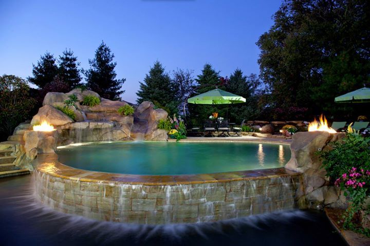 Did You Know The Cost Of Adding An In Ground Swimming Pool To Your Home Ranges On Average Between 33000 570 Pool Hot Tub Tropical Pool Indoor Outdoor Pool