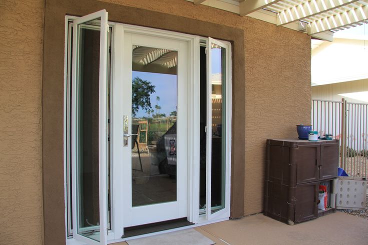 A Single French Door With Two Operating Casement Window Sidelights Opened Patio Doors French Doors With Sidelights, Sliding French Doors With Sidelights