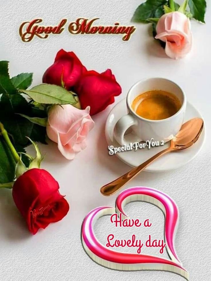 A Cup Of Coffee And Some Roses On A Table a-cup-of-coffee-and-some-roses-on-a-table