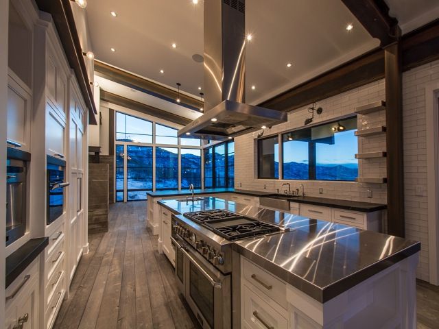 amazing kitchen features a sloped ceiling over a kitchen cheap interior designers