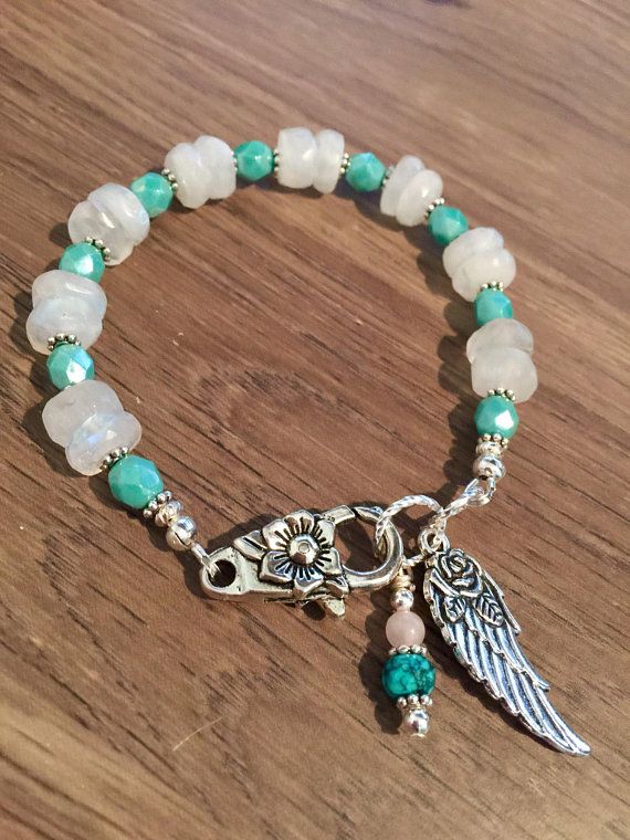 Sterling Silver And Turquoise Beaded Stretch Bracelet With Angel Wing Charms