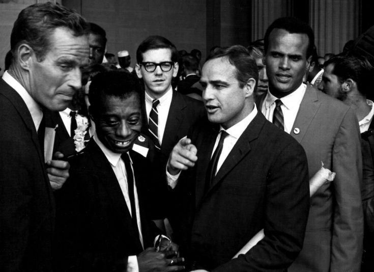 Charlton Heston, James Baldwin, Marlon Brando and Harry Belafonte at