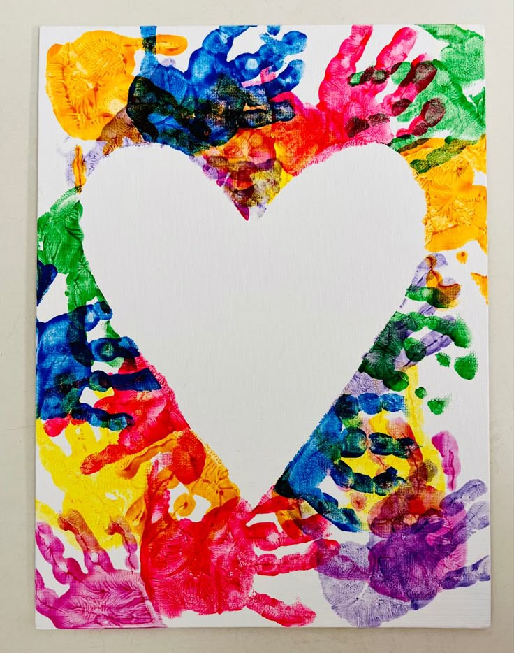 A Heart Made Out Of Handprints On A Piece Of White Paper With A Heart Made Out Of Handprints On A Piece Of White Paper With