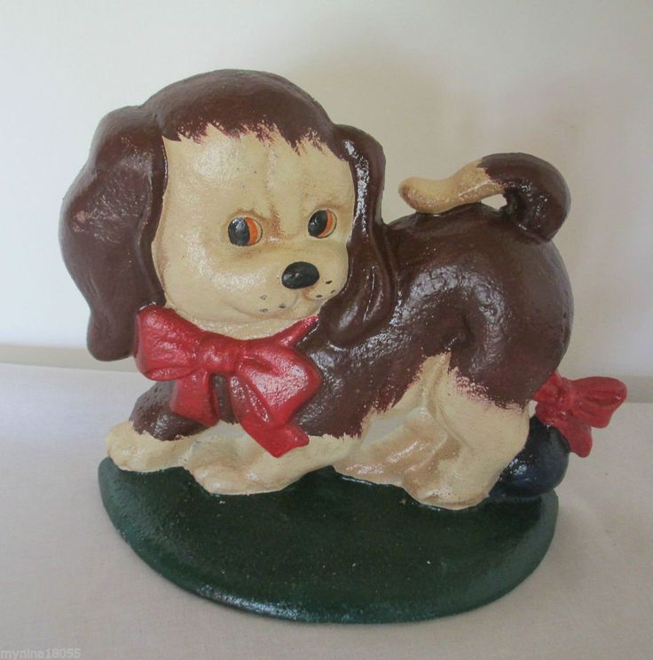 22 Best Cast Iron Doorstopore Images On Pinterest Door Stop Cast Iron Brown And White Puppy With A Red Bow Toy Door Stop