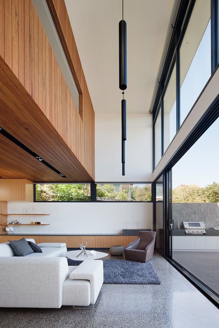This home by architects plays with internal scale to make the most of sweeping views across melbourne cbd