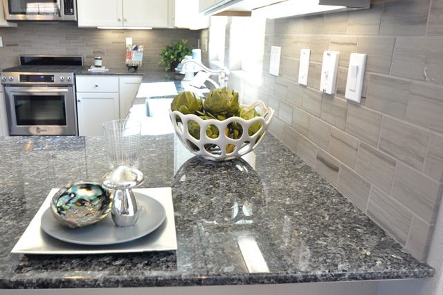gray brick pattern backsplash, white cabinets, dark gray/black gray brick pattern backsplash, white cabinets, dark gray/black