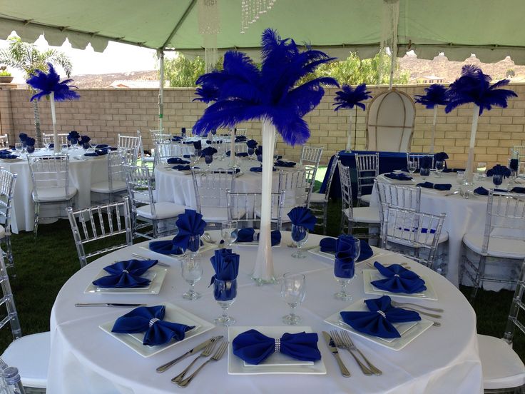 Royal Blue White Table Setting Note Napkins On Plates With Sparkly Napkin Rings And African Wedding Dress White Table Setting Note Blue Napkins, Royal Blue Table Set Up