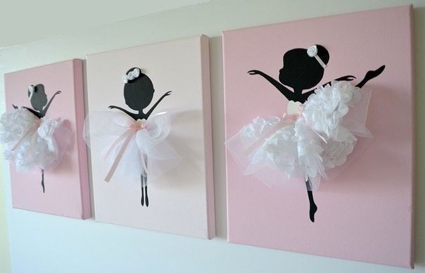 three wall hangings decorated with paper flowers and tulle skirts on pink canvases