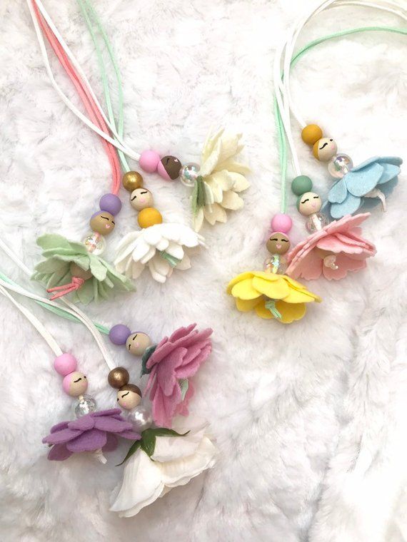 Inspired by all things lovely. These whimsical flower Fairy necklaces inspire cr...