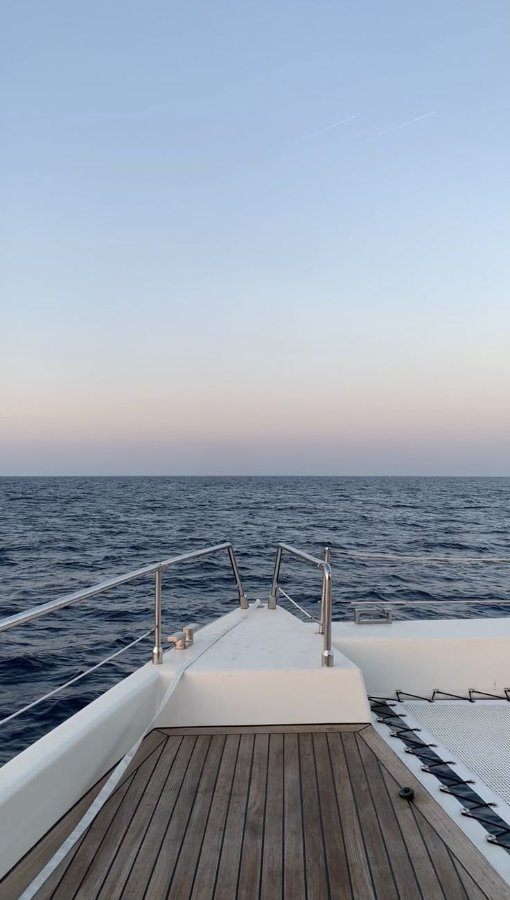 the deck of a boat in the middle of the ocean