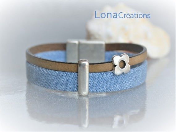 Khaki leather strap and denim blue fabric, Cuff Bracelet, Silver Flower passing and silver zamak clasp Khaki leather strap and denim blue fabric, Cuff Bracelet, Silver Flower passing and silver zamak clasp