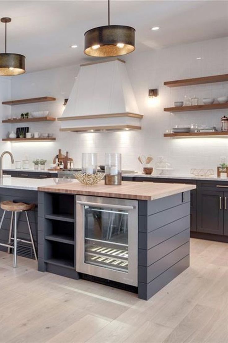 Modern farmhouse kitchen design island with beverage centre modern farmhouse trickle creek designer homes trickle creek custom homes modern farmhouse
