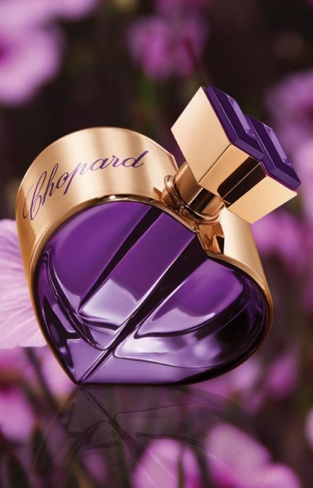 perfume purple bottle with flowers