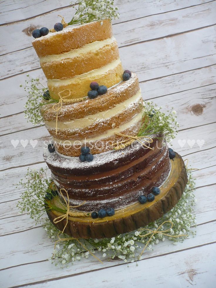 Naked Rustic Ombre Wedding Cake With Gypsophelia And Blueberrys Naked Rustic Ombre Wedding Cake With Gypsophelia And Blueberrys