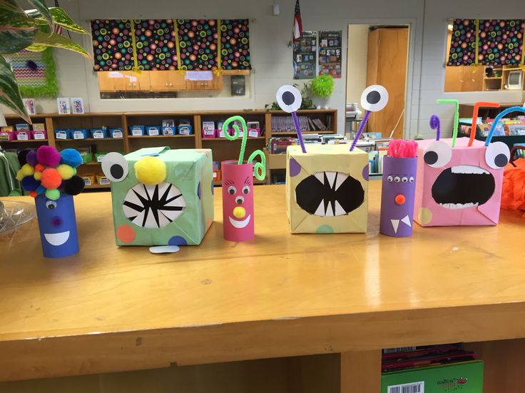 Monsters created out of tissue boxes, milk cartons and jugs. | Monster