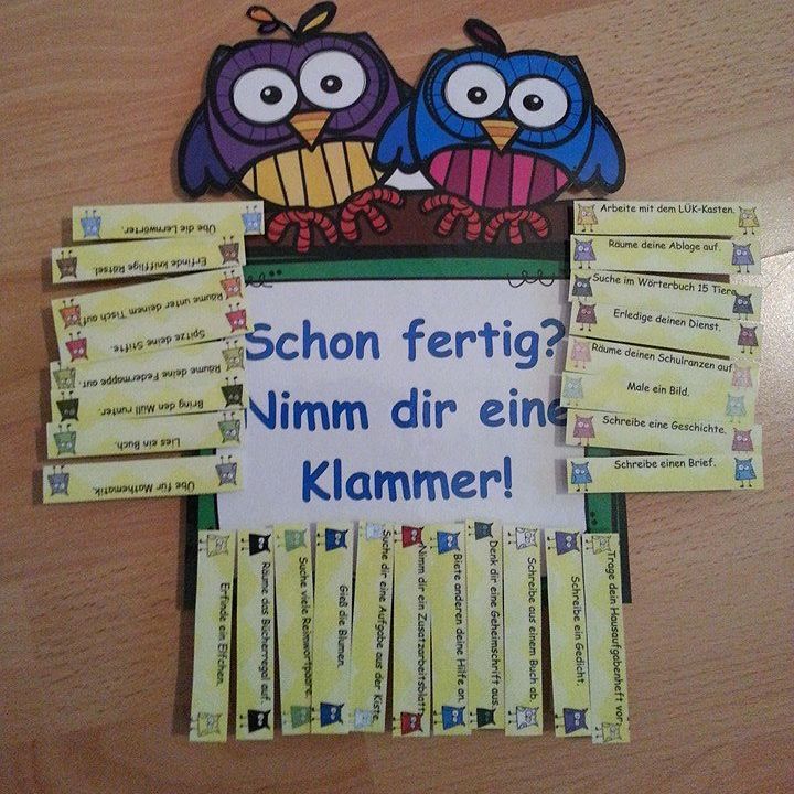 a bulletin board with two owls sitting on it's side and the words schon fertig? wimm dir eine klammer