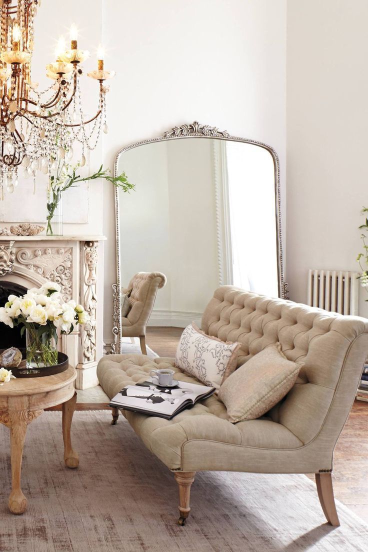 Beautiful shades of cream and mix of gold and silver parisian chic living room