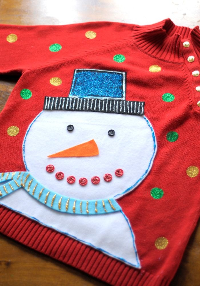DIY Ugly Christmas sweater project - Add a little Tulip Glitter dimensional paint a.k.a. puffy paint and sparkle products to make this one-of-a-kind snowman sweater for your next holiday party. Project via Tiny Rotten Peanuts!