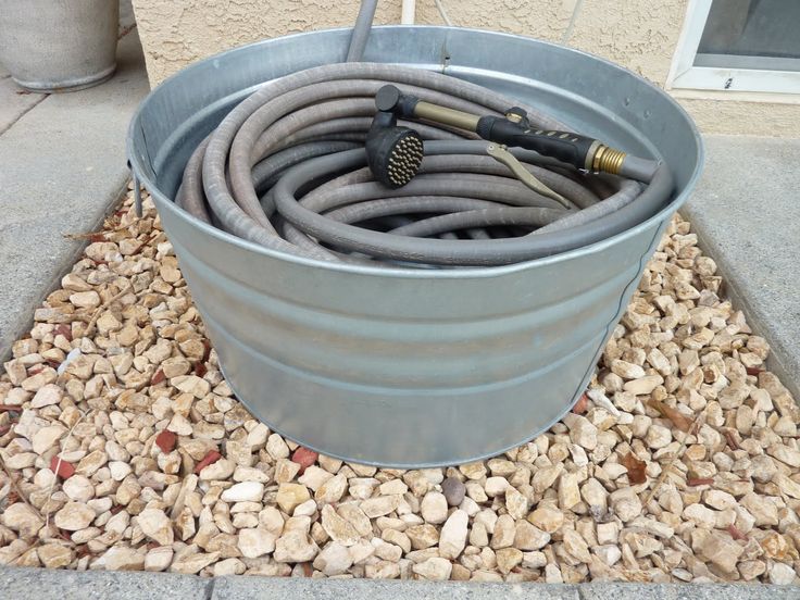 10 Creative Garden Hose Storage Ideas Holder 10 Creative Garden Hose Storage Ideas, Garden Hose Bucket With Lid