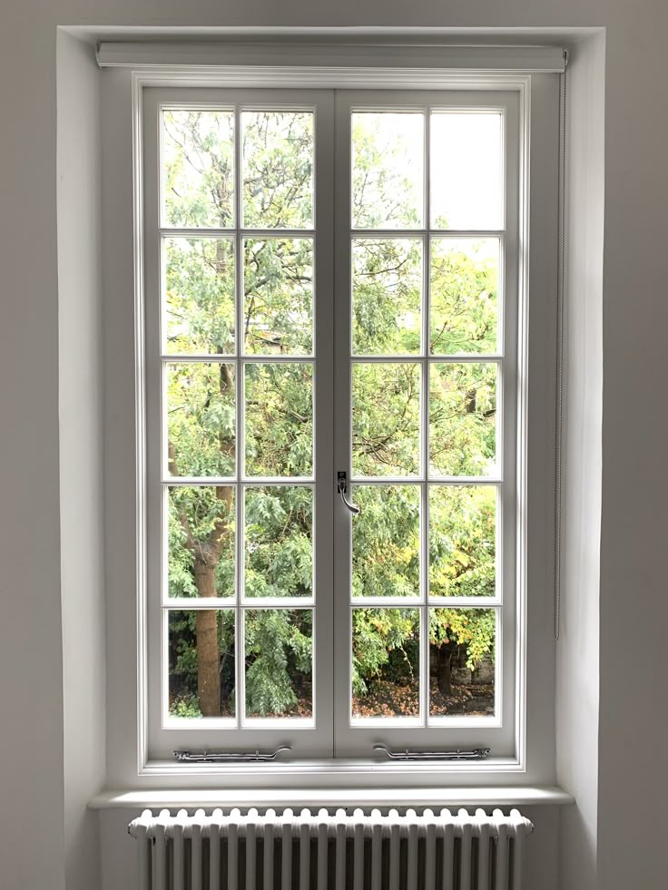 Large multi paned conservation casement window by Amodus Edith Grove Large multi paned conservation casement window by Amodus Edith Grove