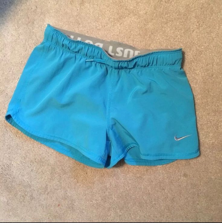 Blue Nike dri fit shorts with undershorts built in. Really cute and ...